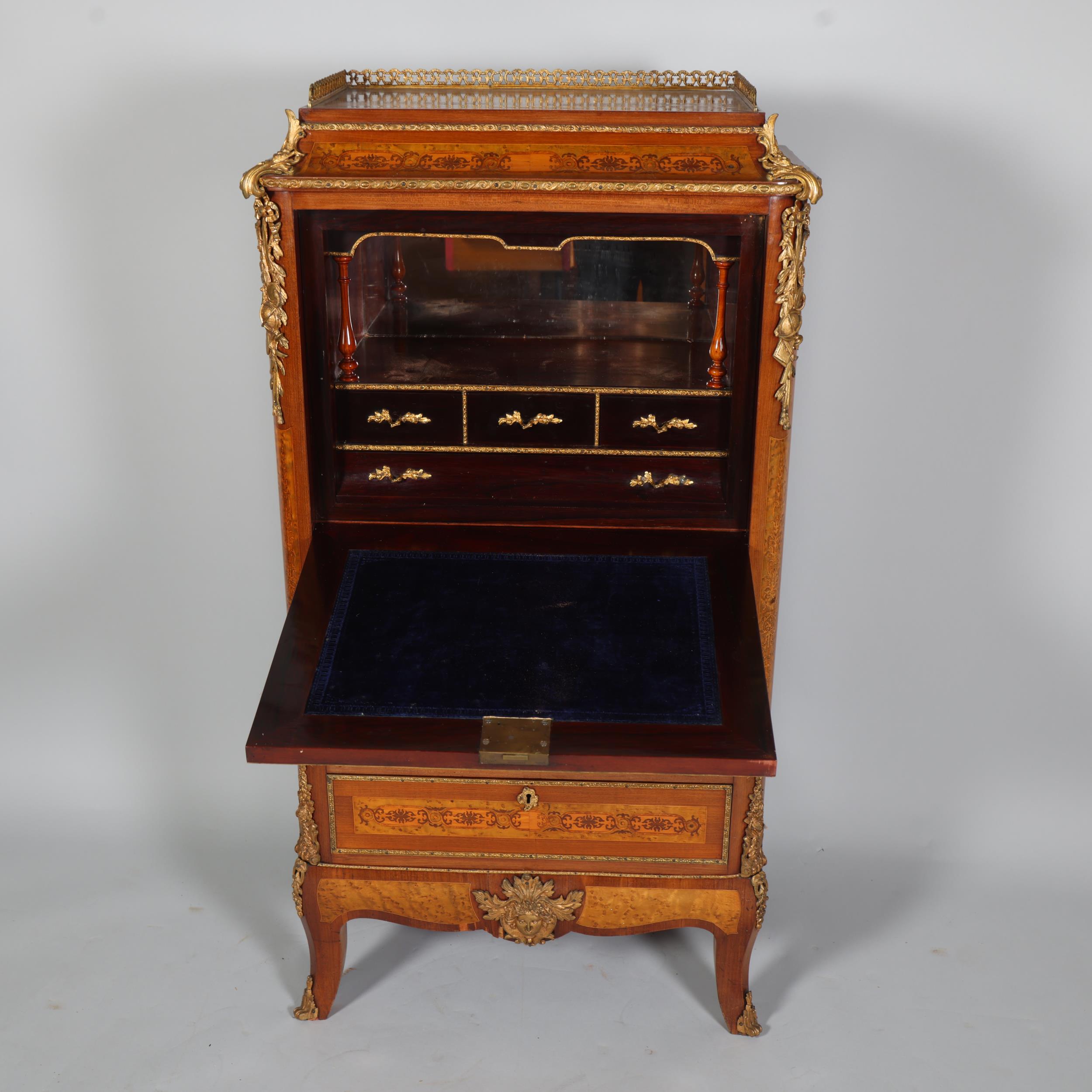 An ornate French mahogany and marquetry inlaid writing cabinet, circa 1900, brass galleried top with - Image 5 of 7