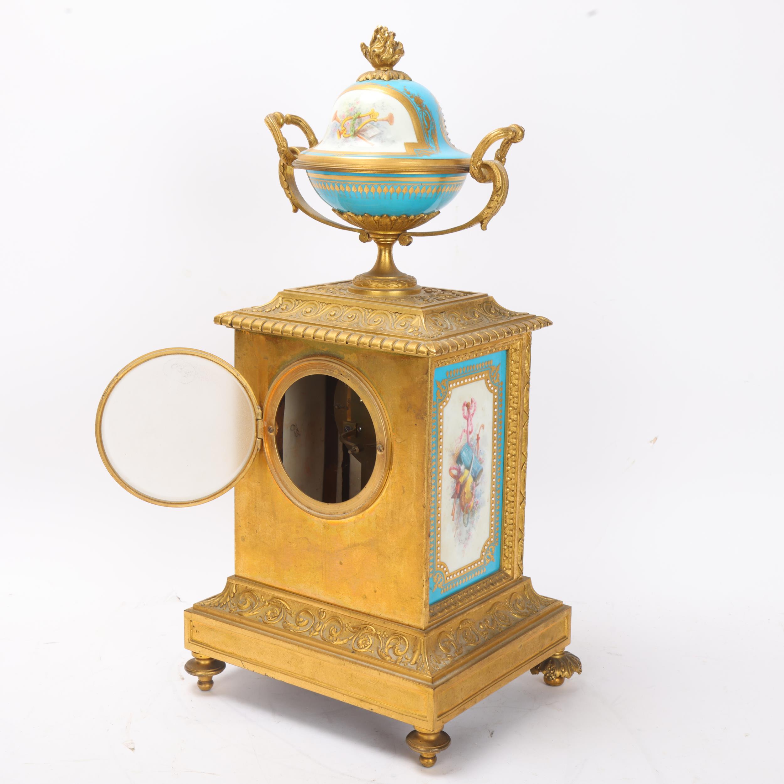 A fine 19th century gilt-bronze and porcelain 8-day mantel clock, with hand painted panels depicting - Image 3 of 3