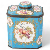 An 18th century Battersea Enamel tea caddy of canted rectangular form, with hand painted panels