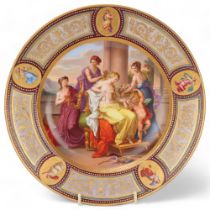 A Vienna porcelain plate depicting Venus and Cupid, gilded panelled border, diameter 24.5cm