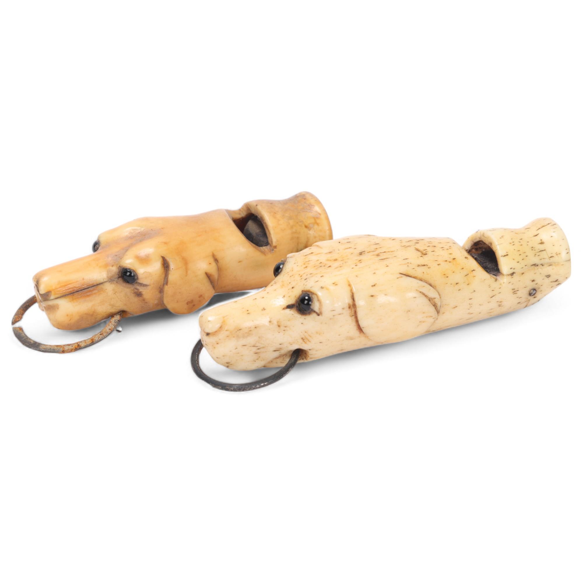 2 x 19th century carved bone dog-head design whistles, largest 7cm (2) Good condition, minor age-