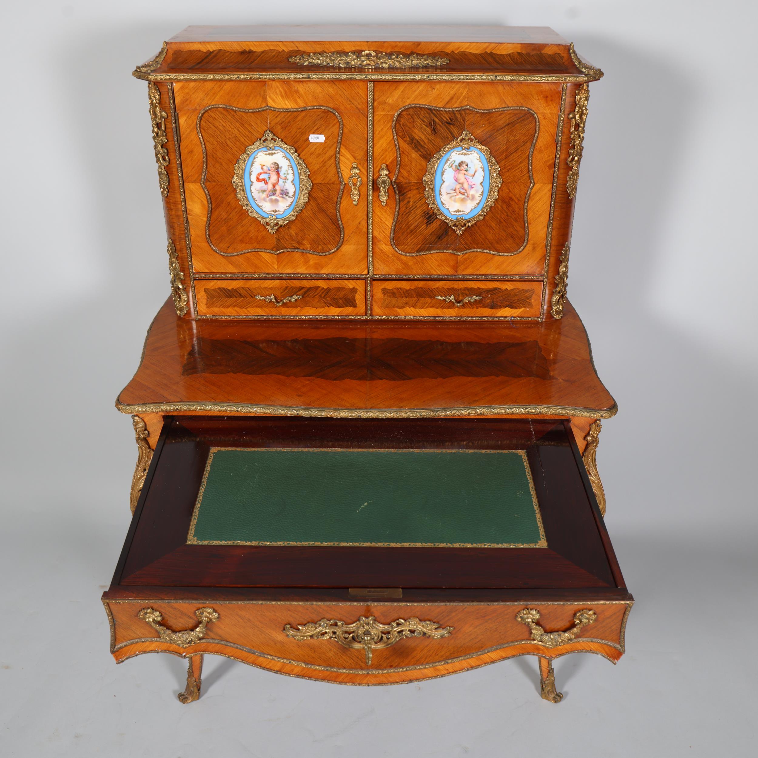 An ornate French kingwood and rosewood writing desk, circa 1900, the upper part fitted with 2 - Image 7 of 9