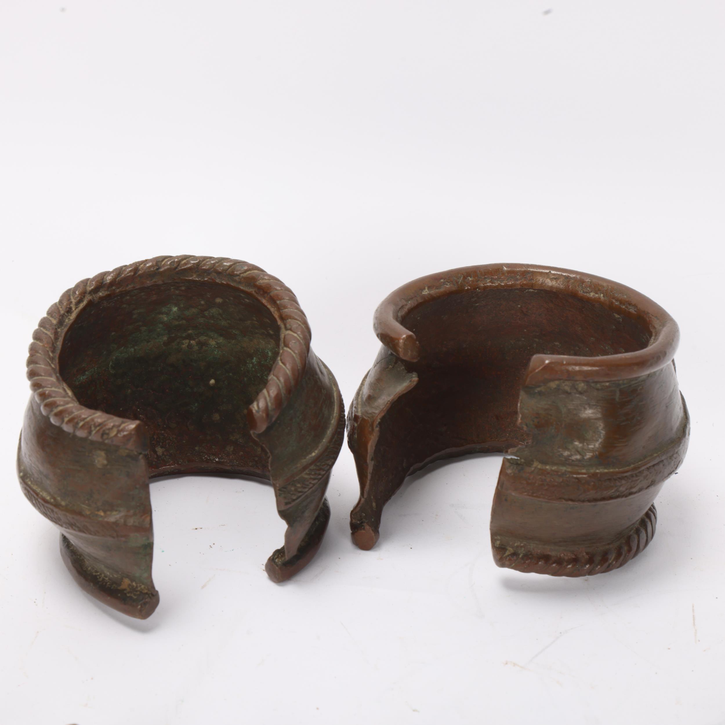 Pair of African bronze bracelets, 2 nickel currency bracelets, and 2 elephant hide bangles - Image 3 of 3