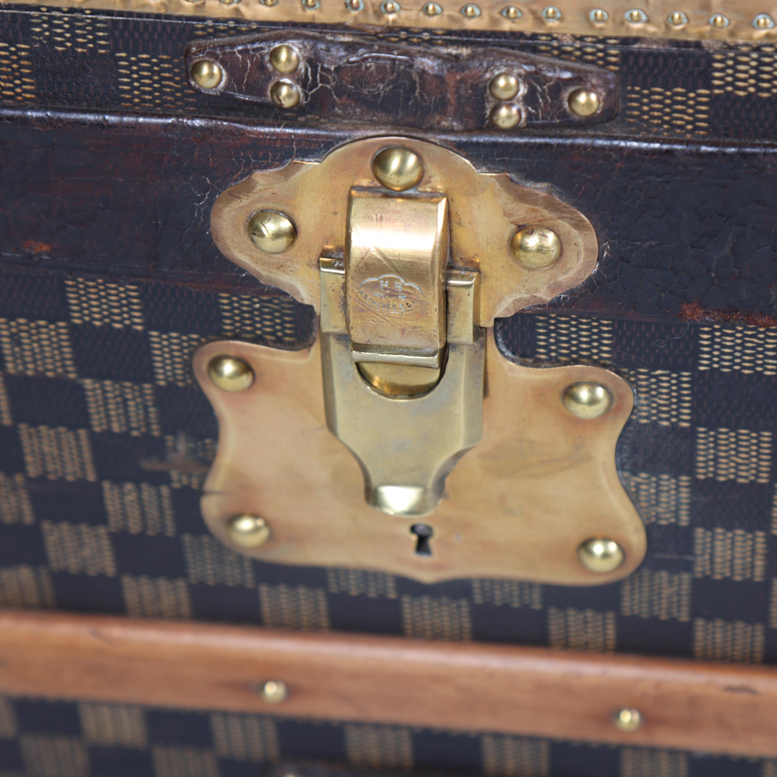 A Vintage French travelling trunk, brass wood and leather-bound with printed canvas panels, Damier - Image 5 of 6