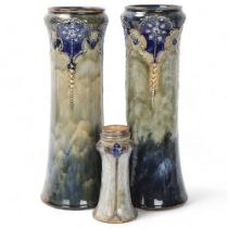 Pair of Royal Doulton stoneware cylinder vases, height 33cm, and Art Nouveau Doulton vase with