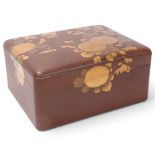 A large Japanese gilded and lacquered box, Meiji Period circa 1890 - 1900, raised gilded blossom