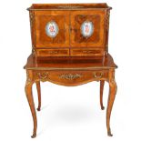 An ornate French kingwood and rosewood writing desk, circa 1900, the upper part fitted with 2