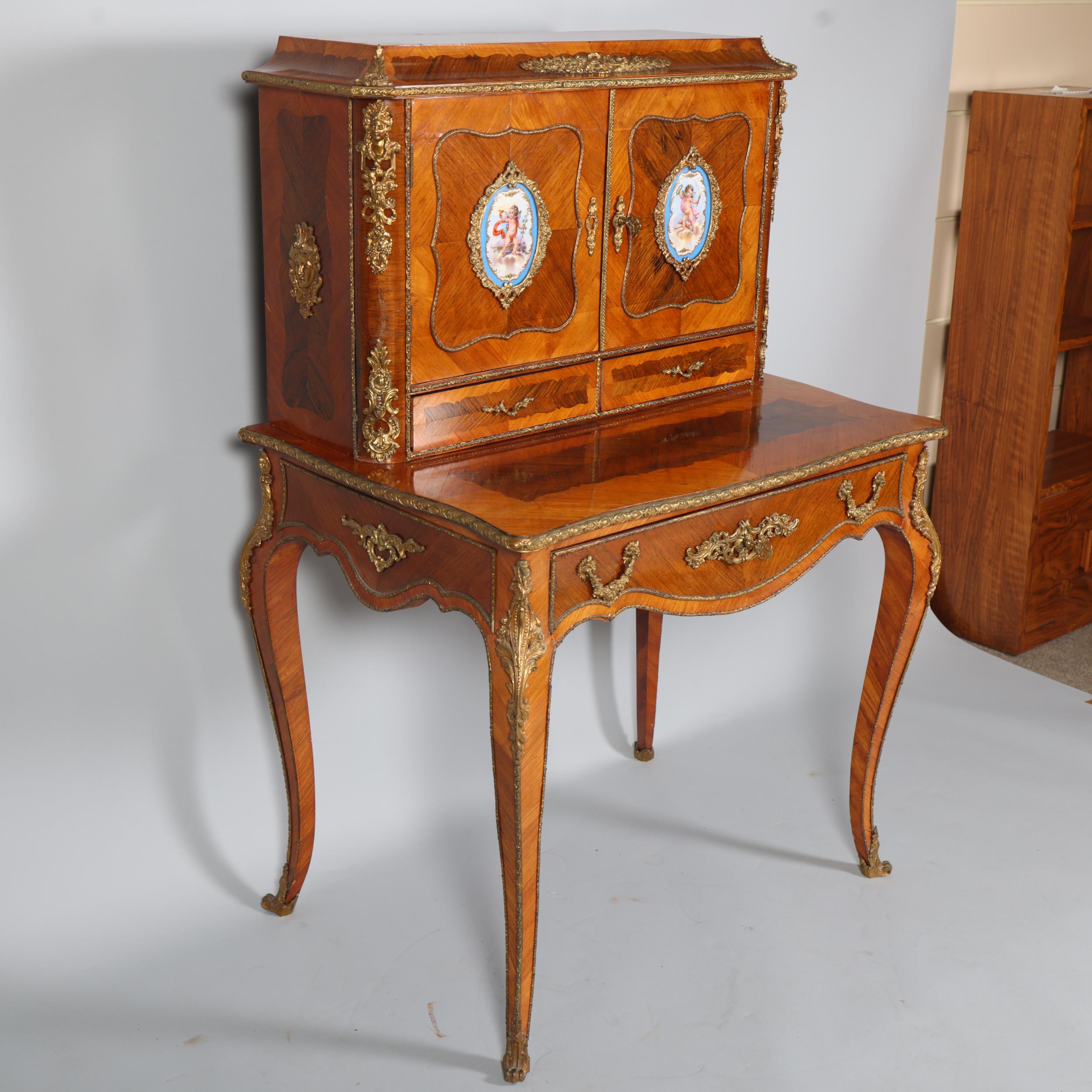 An ornate French kingwood and rosewood writing desk, circa 1900, the upper part fitted with 2 - Image 4 of 9