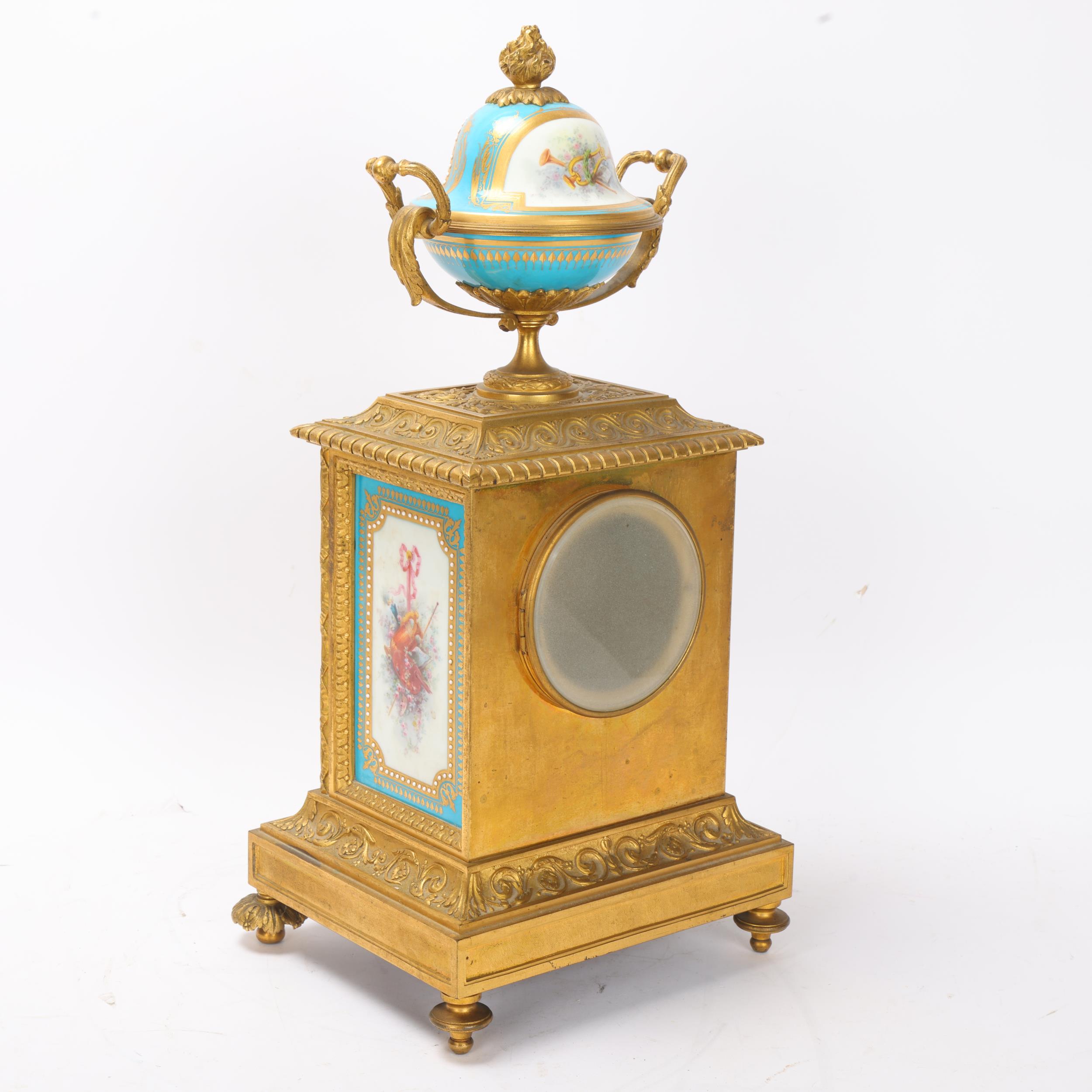 A fine 19th century gilt-bronze and porcelain 8-day mantel clock, with hand painted panels depicting - Image 2 of 3