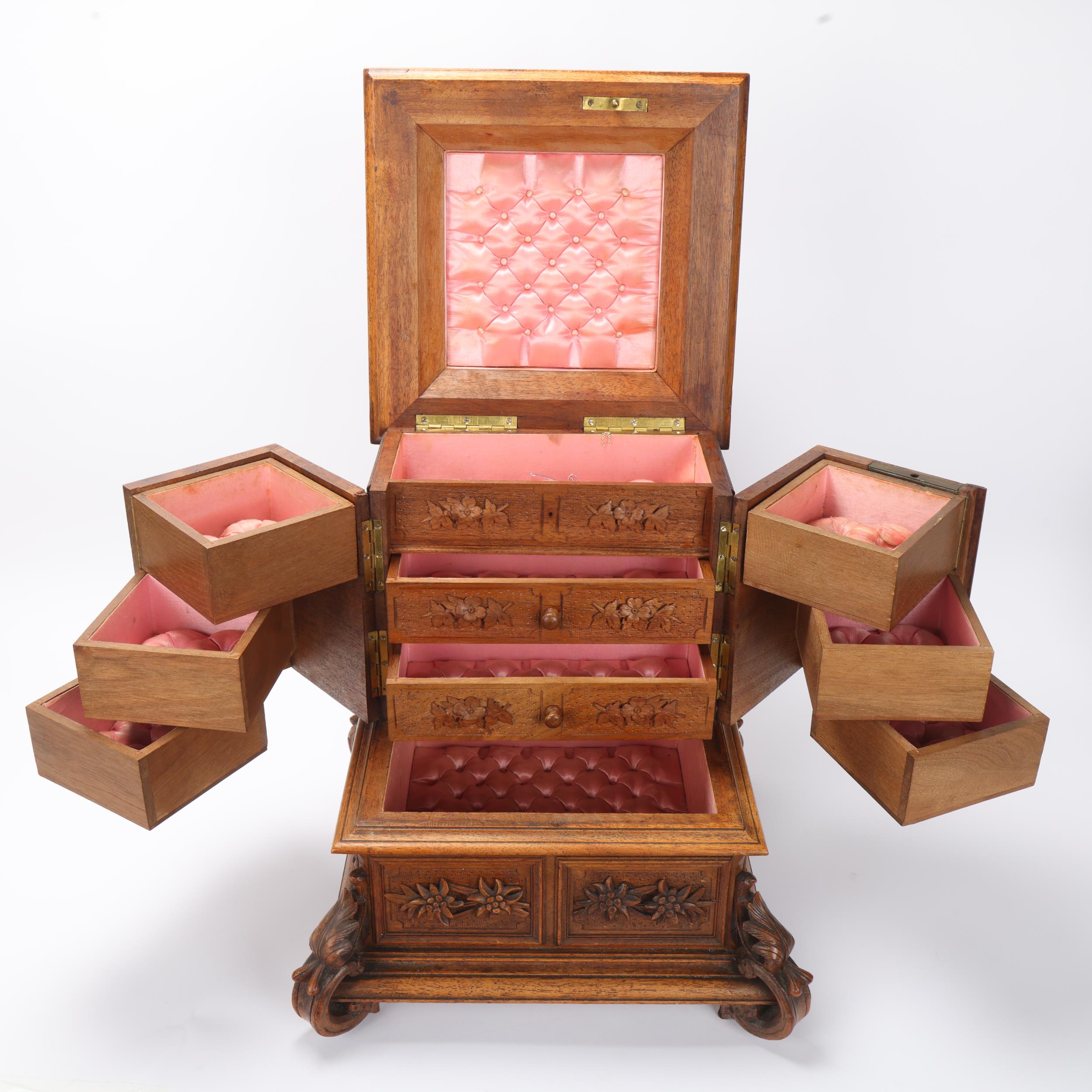 An ornate 19th century Black Forest table cabinet, the lid surmounted a carved wood group of deer, 2 - Image 2 of 3