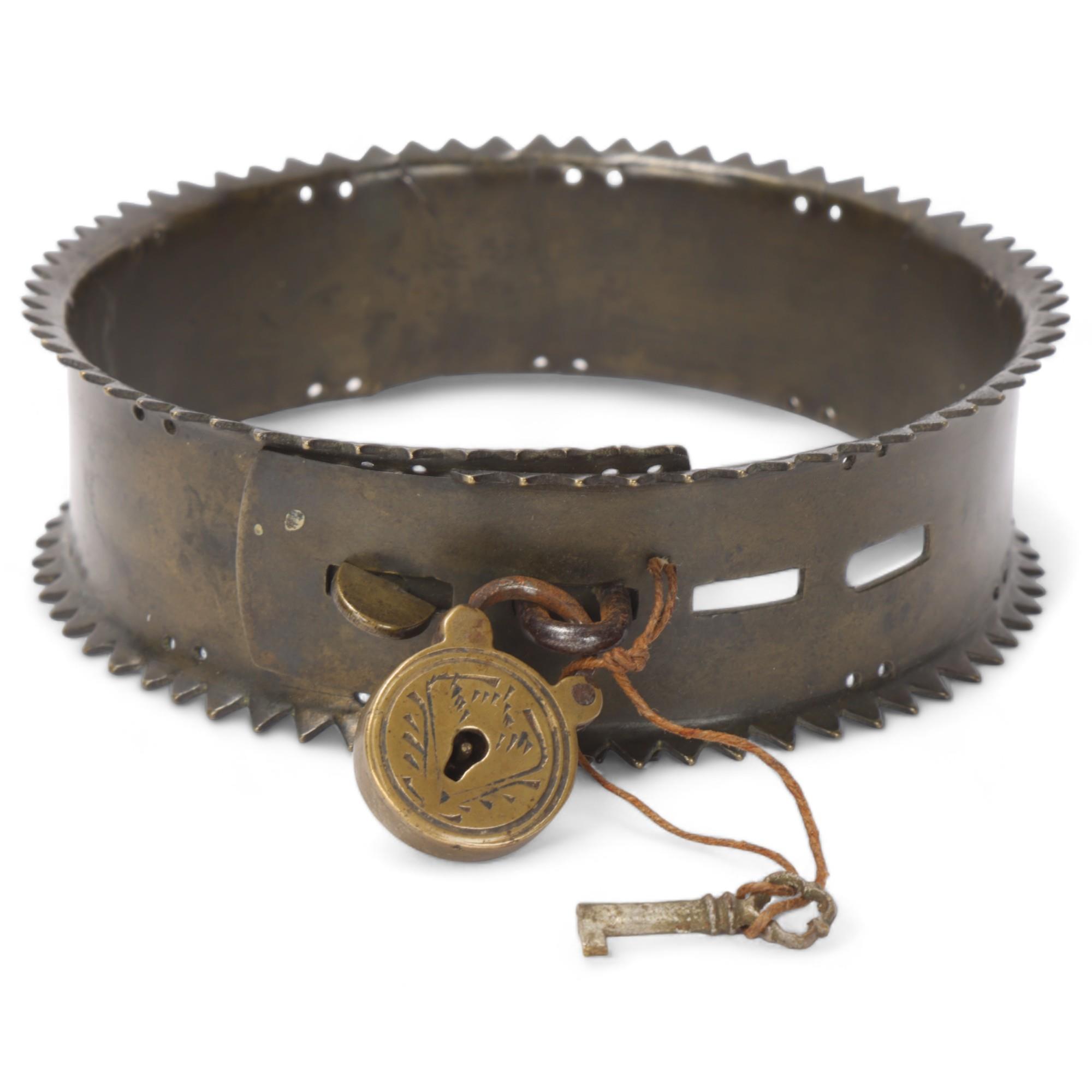 Antique brass dog collar with serrated edge, engraved Howard Esq Lower Close Norwich, complete