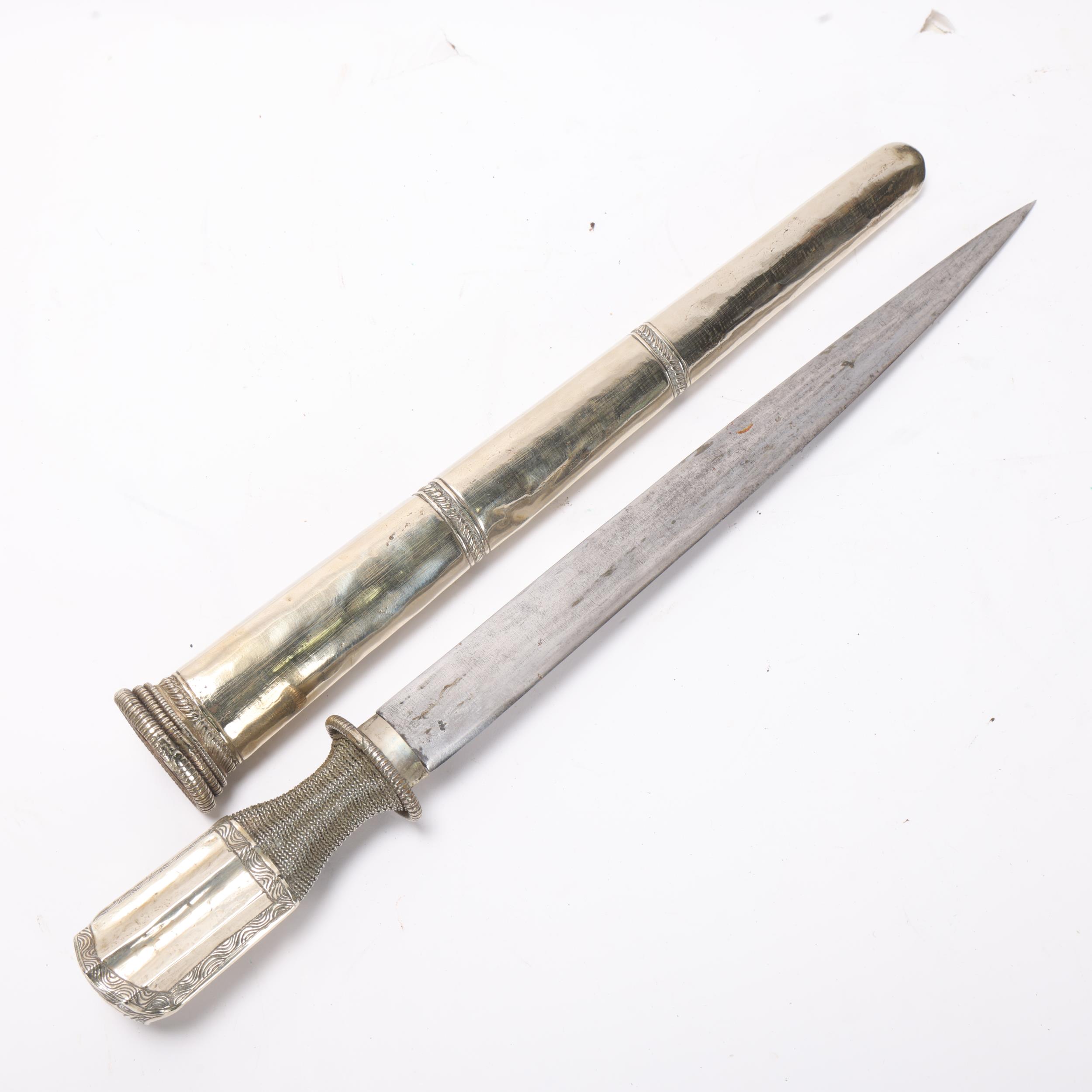 An Indian Sikkim white metal dagger and sheath, 18th-19th century, length 42.5cm, unmarked - Bild 2 aus 3