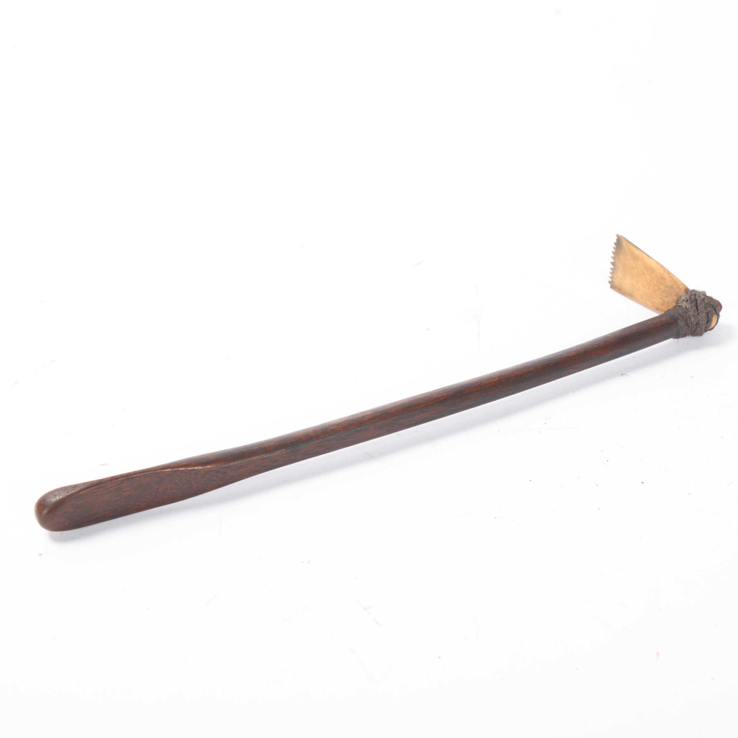 A South Seas Tribal tattoo hammer, bone and wood with rope binding, length 24cm Good condition - Image 3 of 3