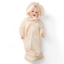 A porcelain-headed baby doll, by Schmidt, Franz & Co, Georgenthal, mould no. 1272, composition