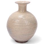 YUSHI ITO (b.1946-), Japanese, a pink salt glazed hand thrown bottle vase, in original wooden