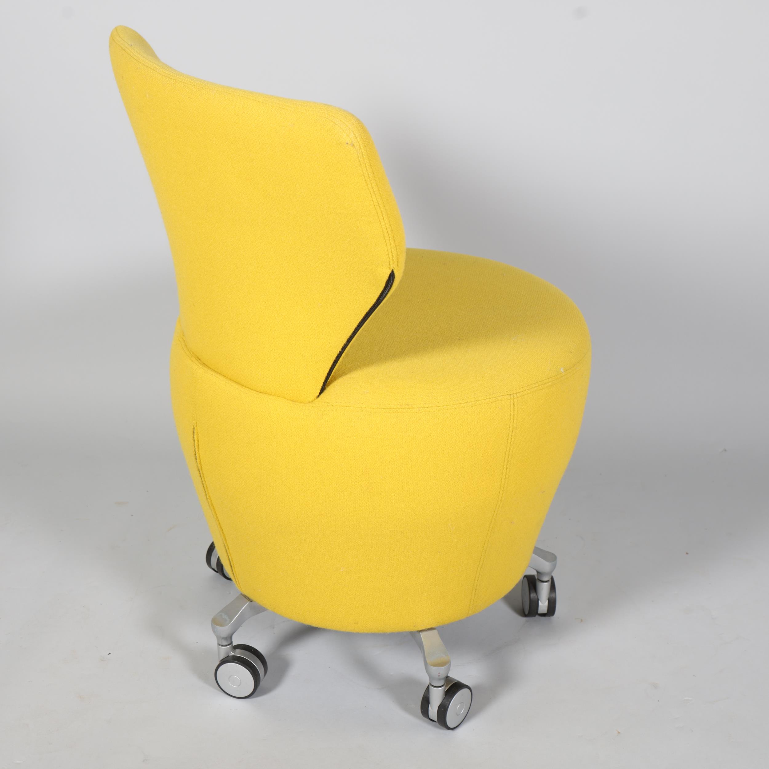 An Orangebox chair on casters, with yellow wool upholstery, makers marks to base , height 81cm - Image 2 of 3