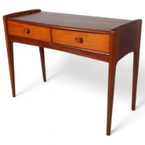 JOHN HERBERT for A Younger Ltd, a teak console table or desk with two drawers, makers label to