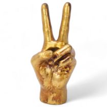 A "V for victory" plaster modelled and gilded hand/vessel, no makers marks, height 29cm Good