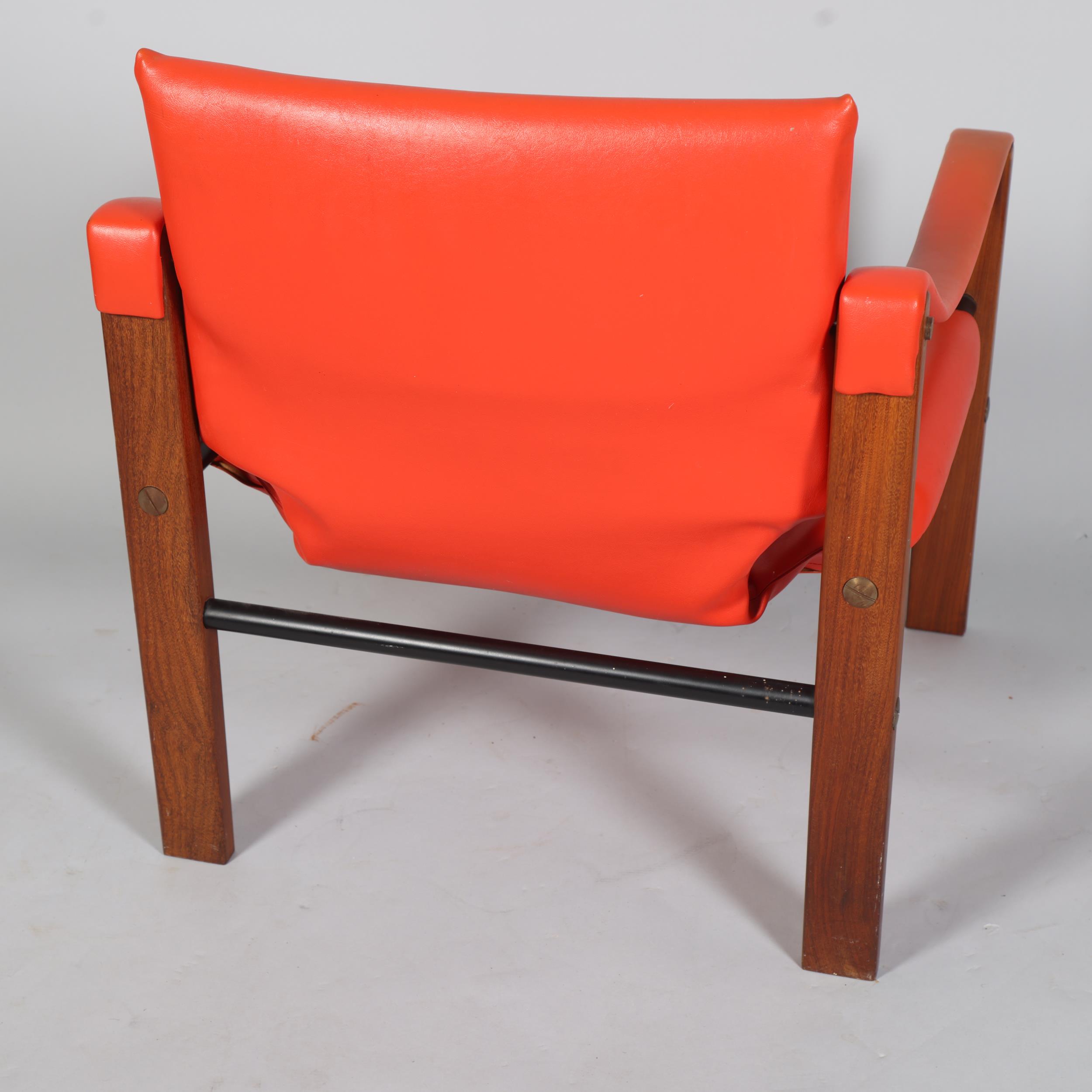 MAURICE BURKE for Arkana, a mid 20th century safari chair, red faux leather upholstery with hardwood - Image 4 of 4