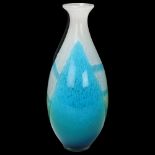 A hand blown blue/green glass vase, with polished pontil to base, no makers marks, height 28cm