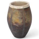 A studio pottery raku fired barrel vase, with resist stripes and crackle glaze interior, makers mark