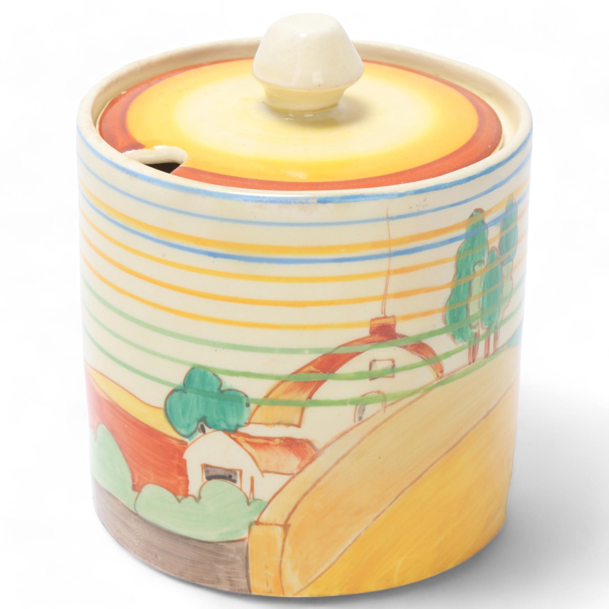 Clarice Cliff Bizarre drum-shaped preserve pot and cover, height 9cm Good condition, no chips cracks