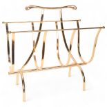 A vintage Hollywood Regency style magazine rack, gilt metal with scrolled handles, height 50cm,