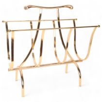 A vintage Hollywood Regency style magazine rack, gilt metal with scrolled handles, height 50cm,