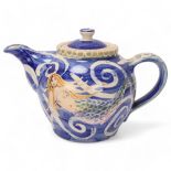 An Iden, East Sussex Delftware teapot, hand painted Mermaid and fish glaze, makers mark and signed