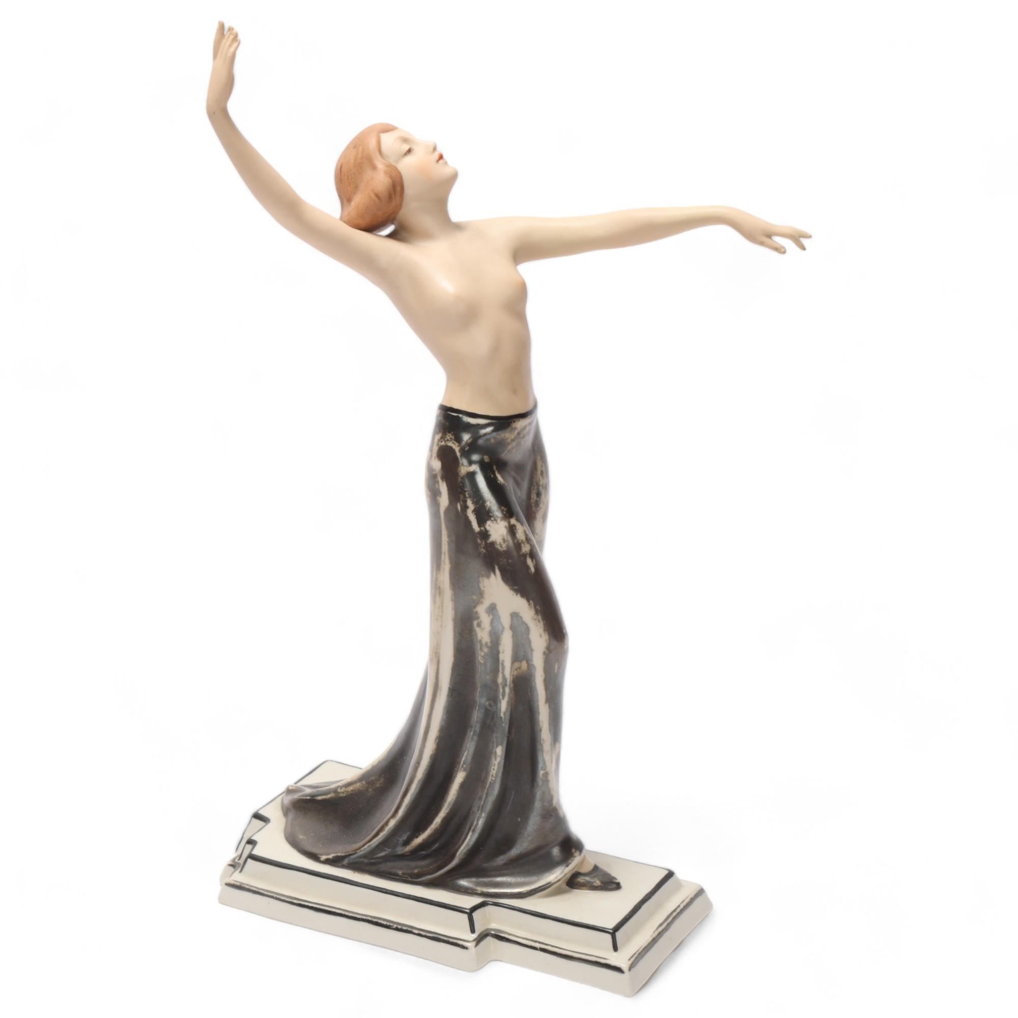 Royal Dux porcelain erotic dancer, height 31cm Good condition, silvering on skirt high points is