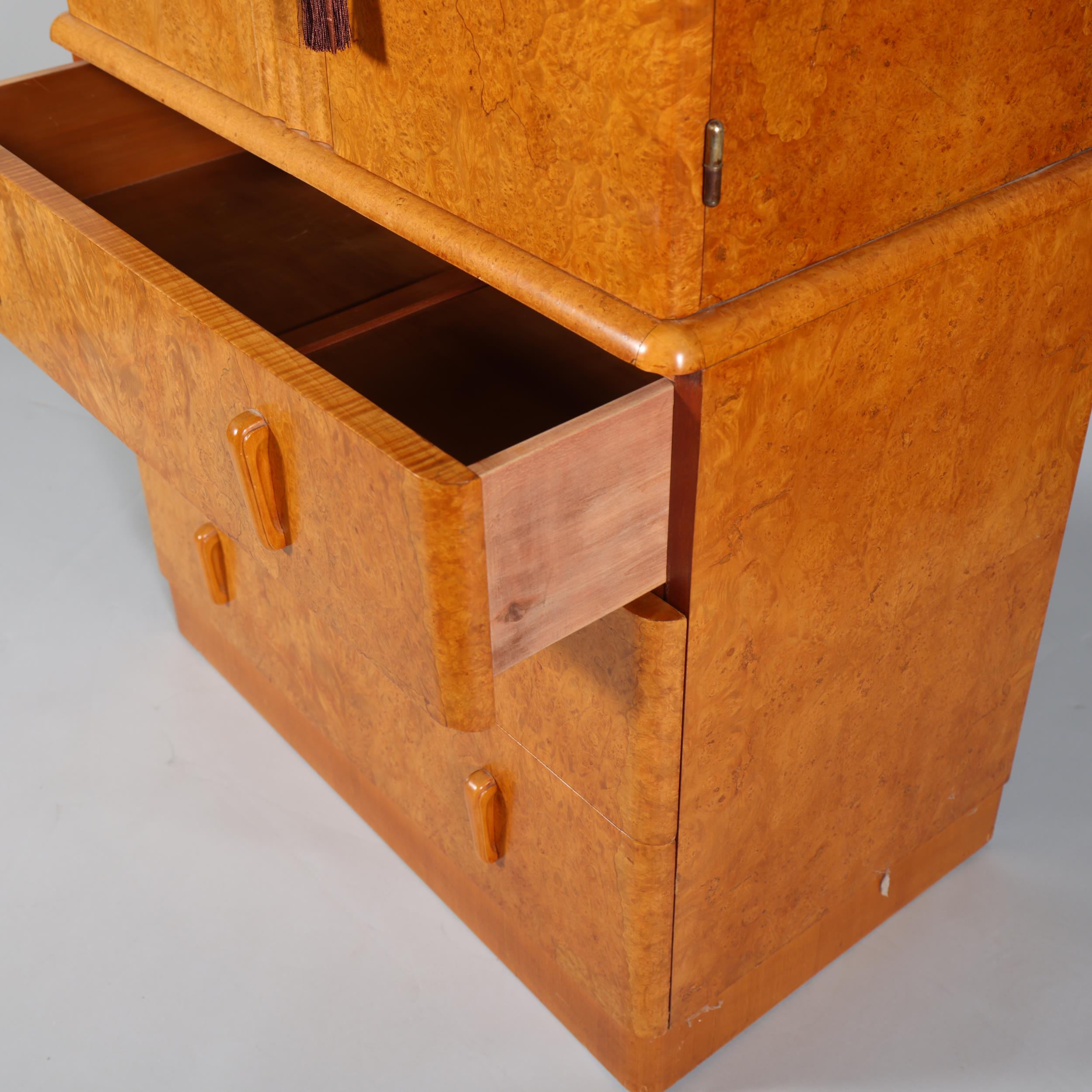 Art Deco birdseye maple tallboy, 2 doors above enclosing shelved interior with 3 long drawers - Image 4 of 5