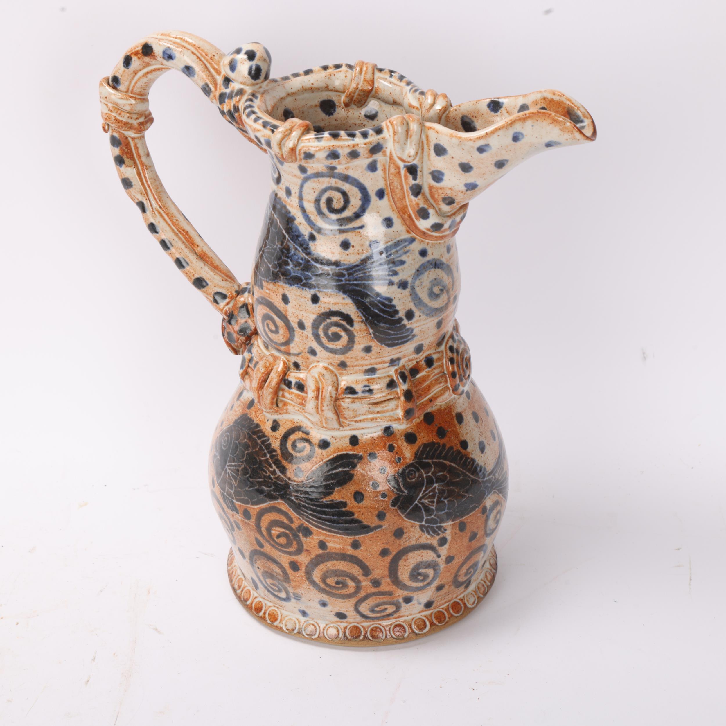A studio pottery stoneware jug with painted fish decoration, signed to base, height 25cm Good - Image 2 of 3