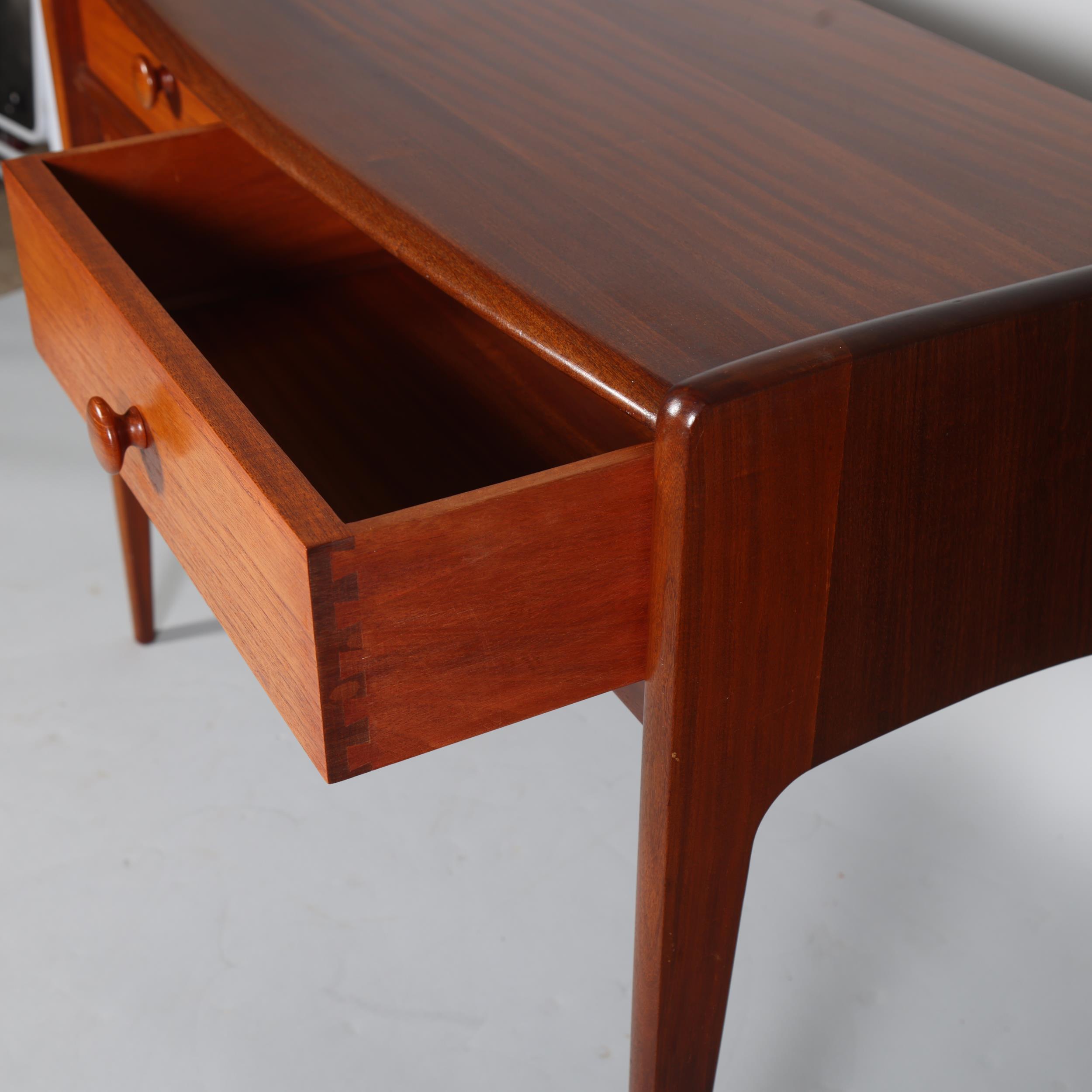 JOHN HERBERT for A Younger Ltd, a teak console table or desk with two drawers, makers label to - Image 3 of 6