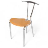 Carlo Bartoli, a Hole chair designed in 1993, the polished aluminium frame with ply seat as seen