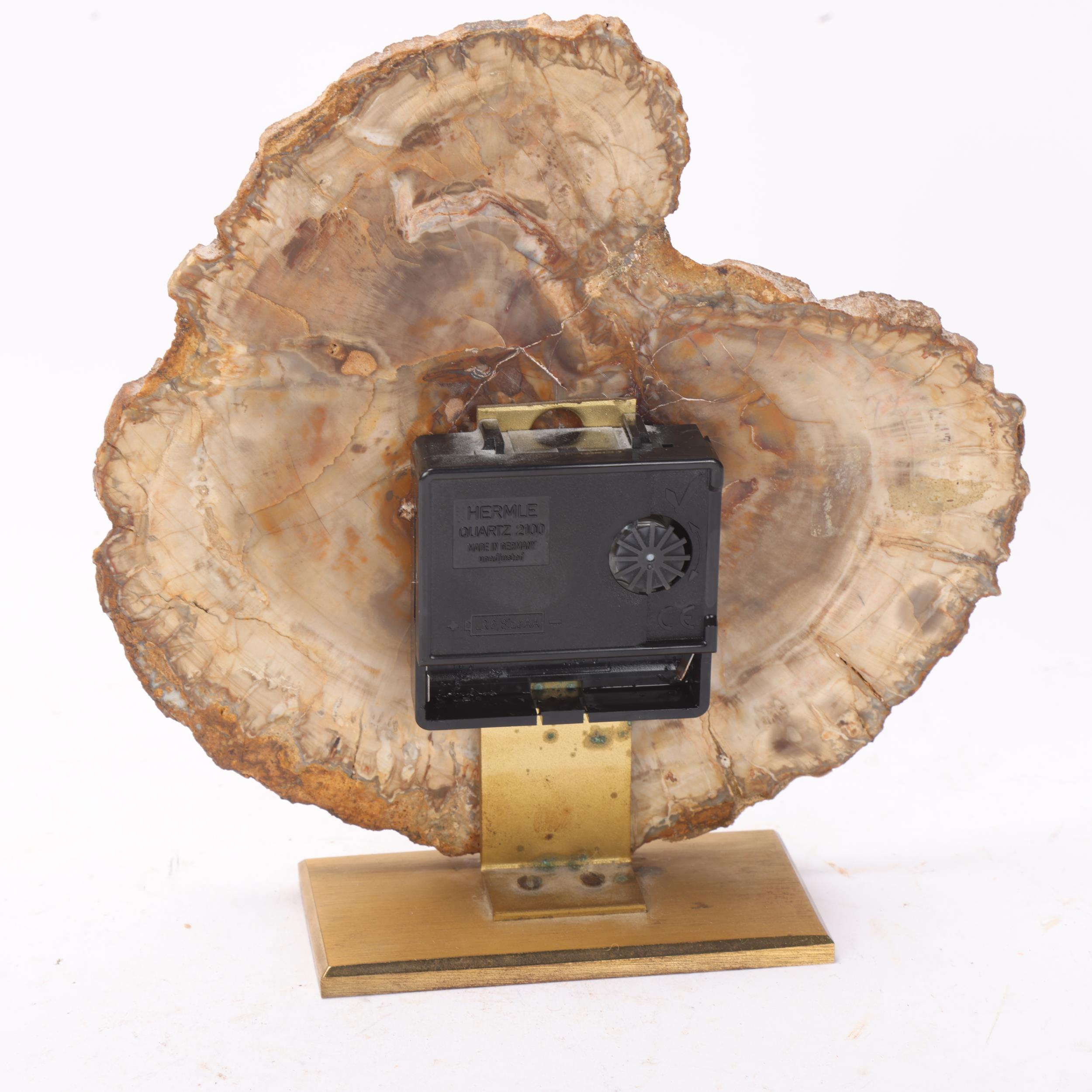 A mid 20th century quartz clock, with a fossilised wood face on brass stand, no makers mark, - Image 2 of 3