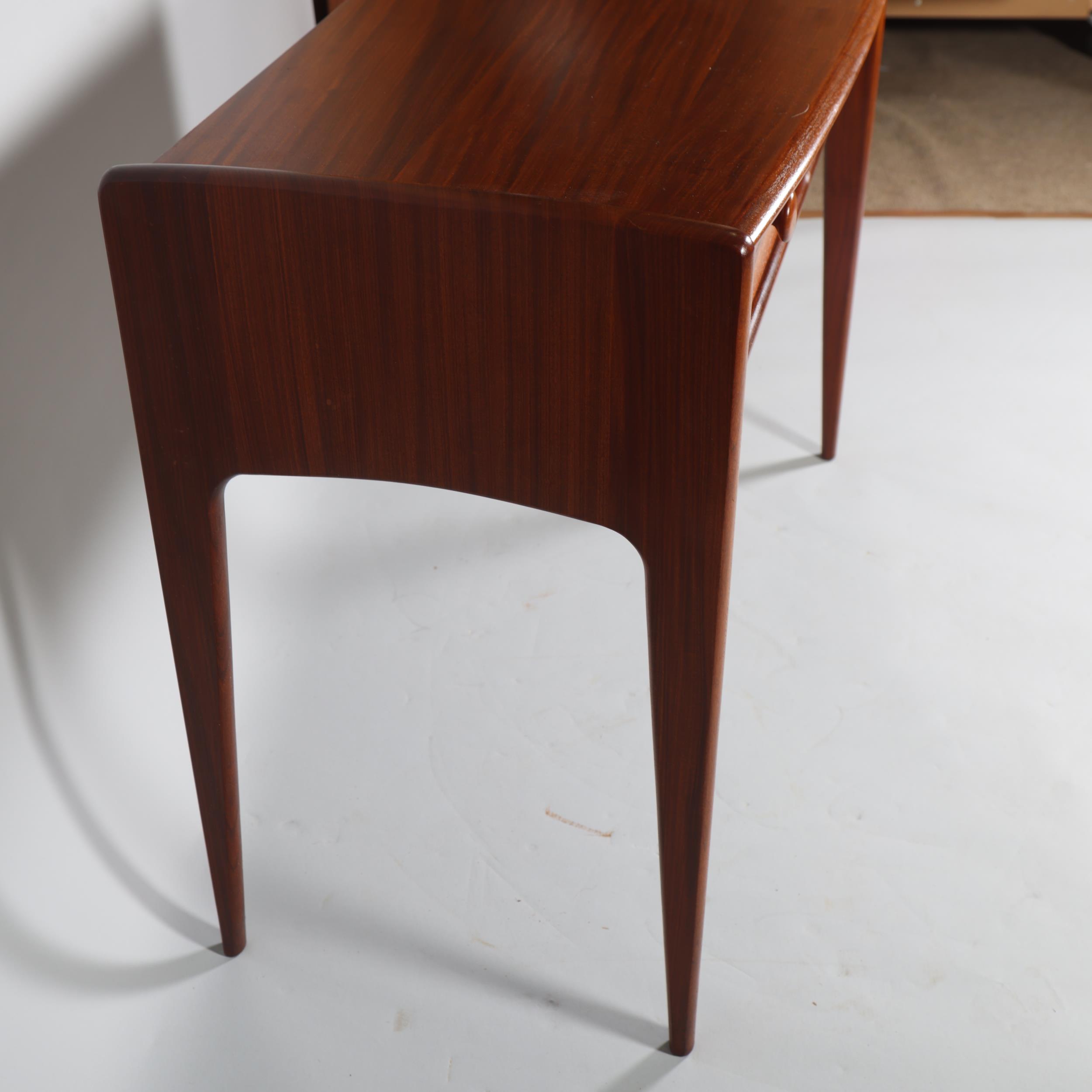JOHN HERBERT for A Younger Ltd, a teak console table or desk with two drawers, makers label to - Image 5 of 6