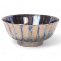 CAROLINE & STEPHEN ATKINSON-JONES, a slip-cast fruit bowl, with bronze lustre glaze, signed to base,