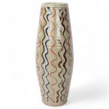 A large studio pottery stoneware barrel vase, with resist, slip and enamel decoration, marked to