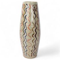 A large studio pottery stoneware barrel vase, with resist, slip and enamel decoration, marked to