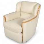 Art Deco cream leather upholstered armchair, with walnut show-wood surround, overall width 68cm