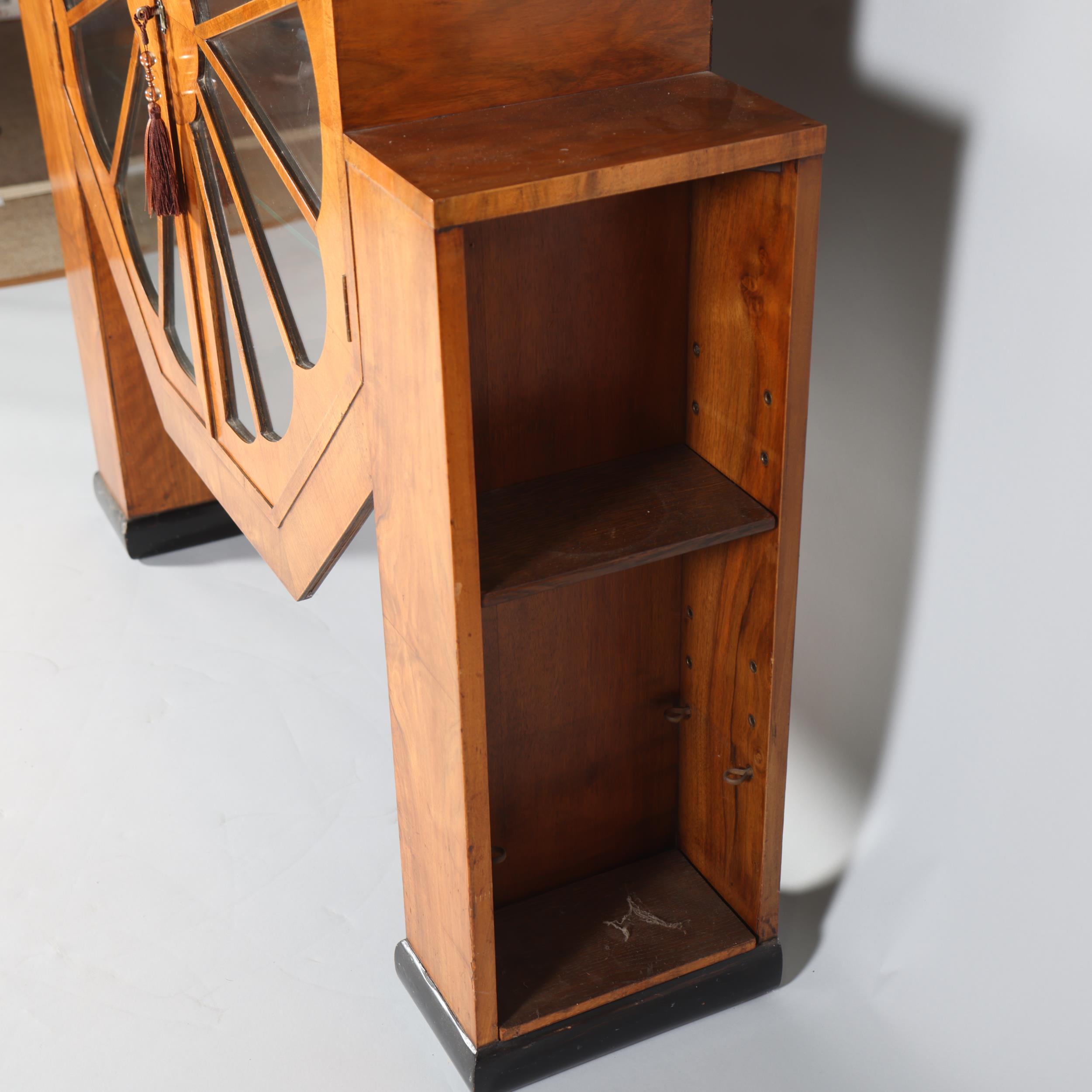 An Art Deco Octagonal shaped display cabinet, walnut veneer cabinet on ebonised feet, with shelves - Image 3 of 5