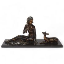 Art Deco gilded and patinated spelter figure of a woman with a fawn, on black marble base, unsigned,