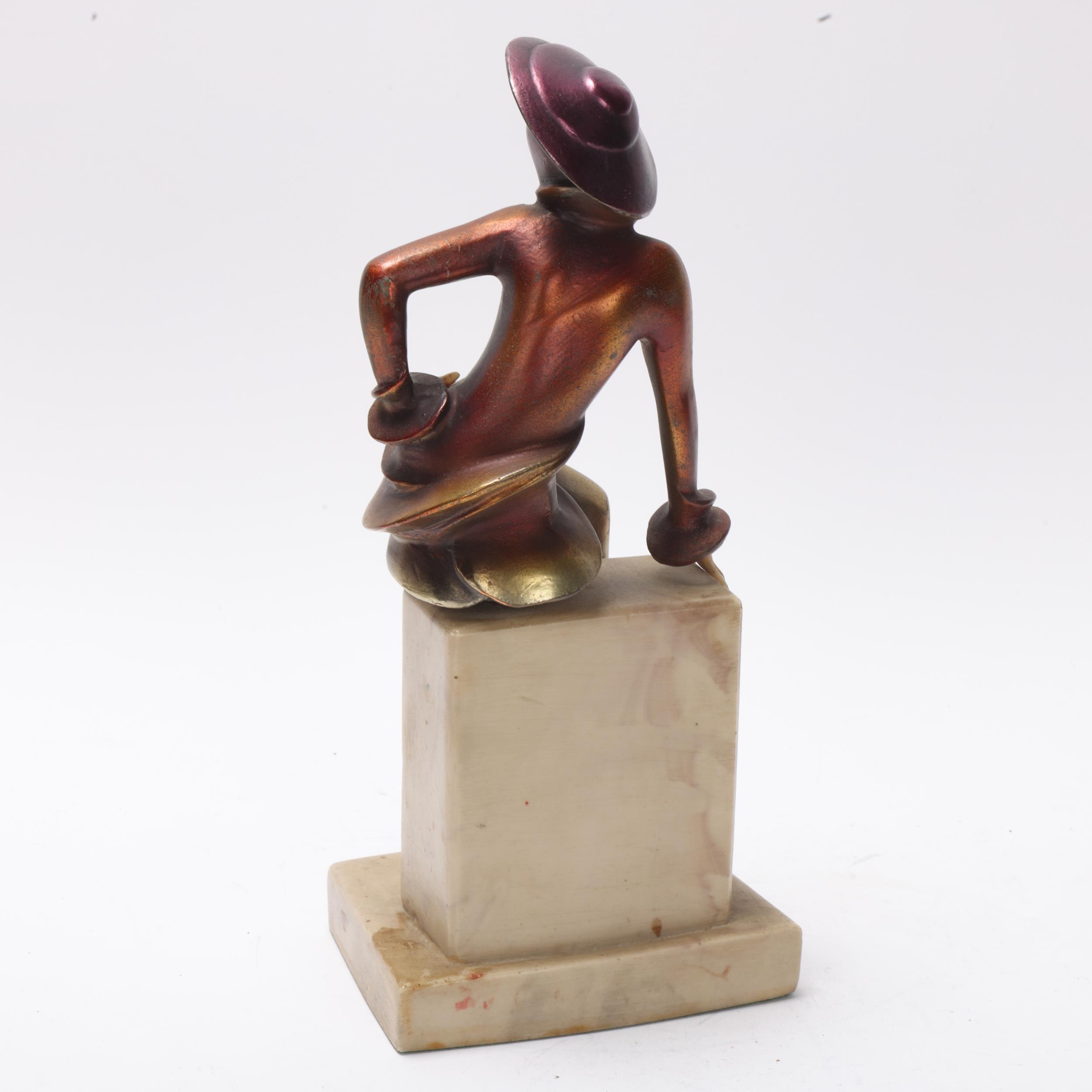 Art Deco patinated spelter figure of a lady, composition face and hands on simulated marble base, - Image 3 of 3