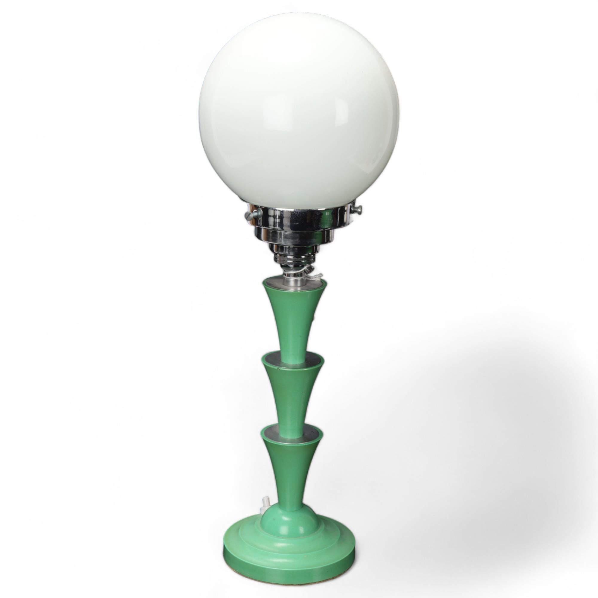 Art Deco green Bakelite table lamp, with chrome fitting and milk glass shade, height approx 40cm