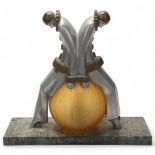 Art Deco aluminium and brass Pierrot clown design table lamp, with amber glass ball shade and marble