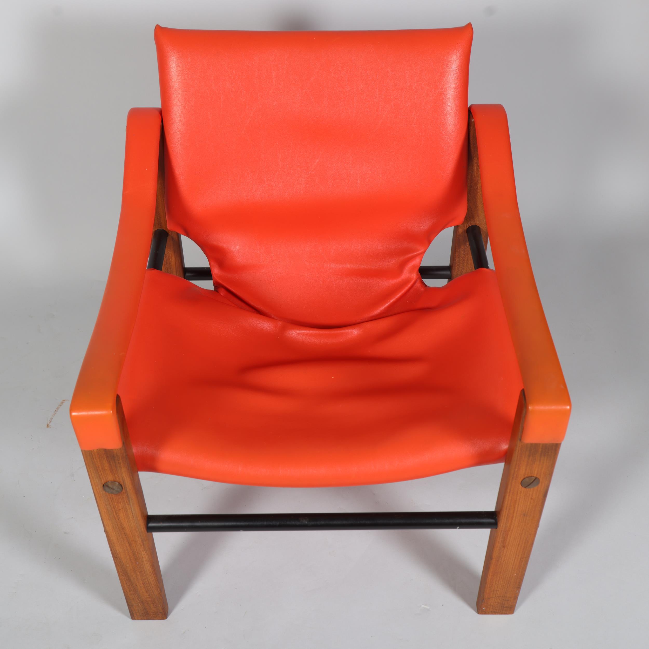 MAURICE BURKE for Arkana, a mid 20th century safari chair, red faux leather upholstery with hardwood - Image 2 of 4