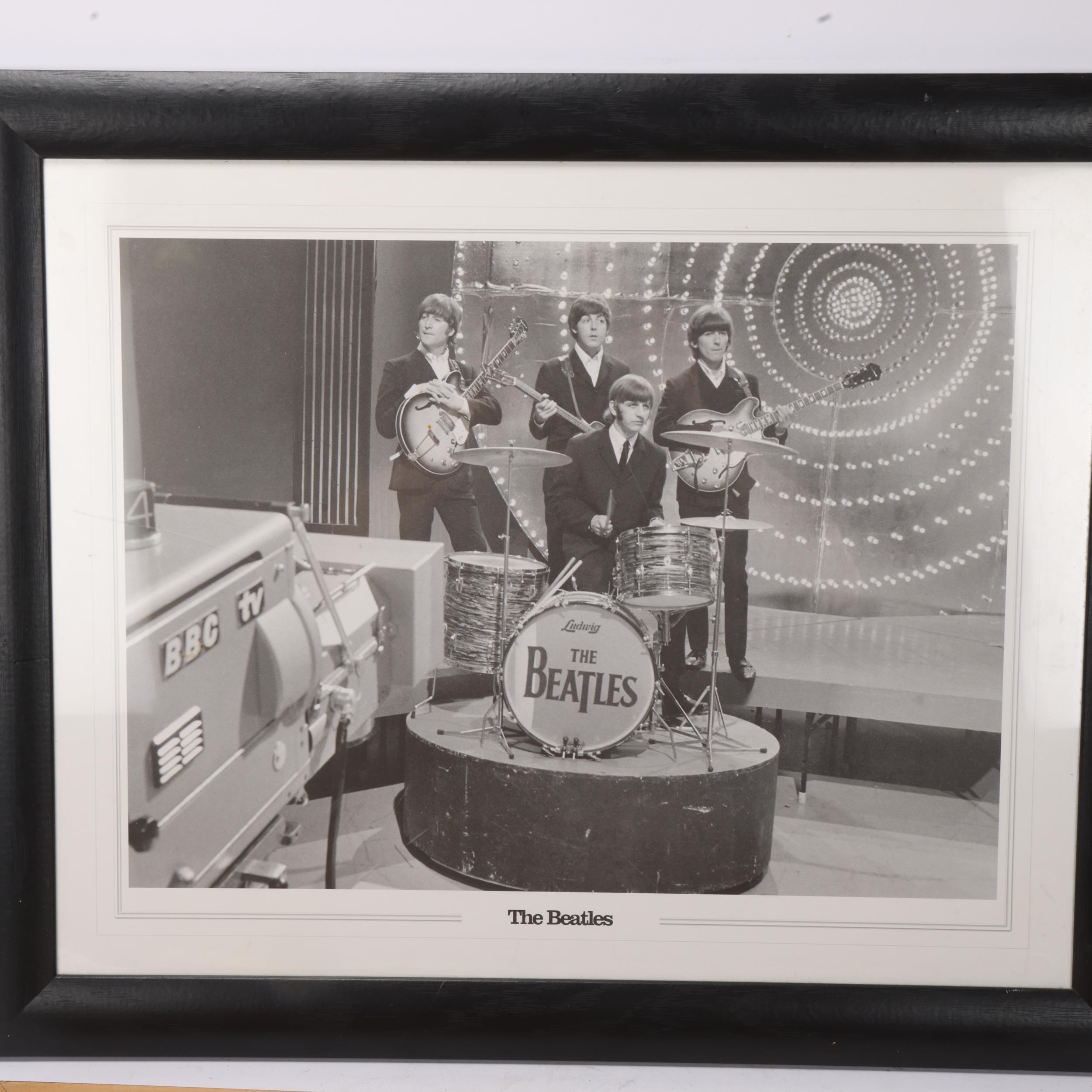 2 photographic prints of The Beatles, largest image 42 x 32cm, both framed Good condition