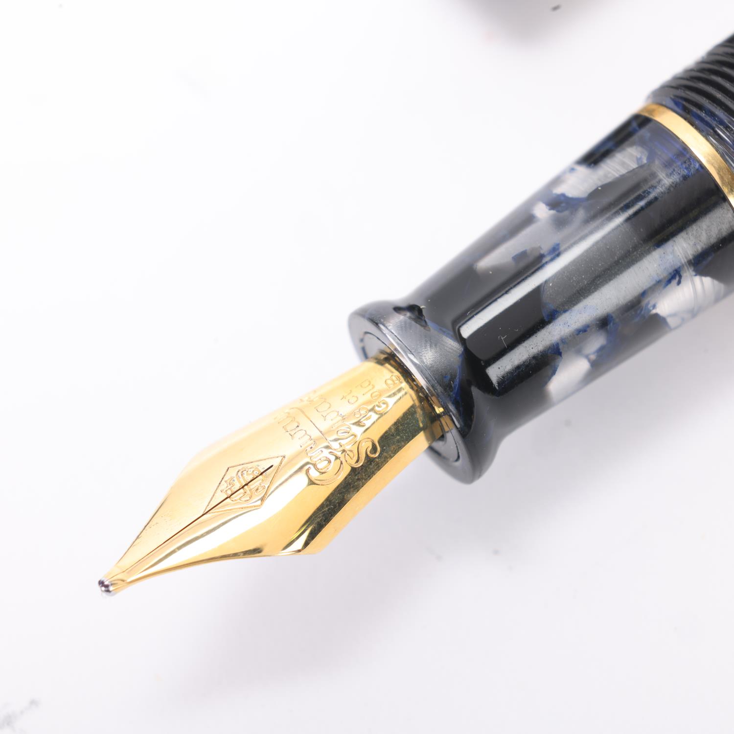A limited edition Conway Stewart "Dandy" lever fill fountain pen, black and clear marble resin body, - Image 2 of 4