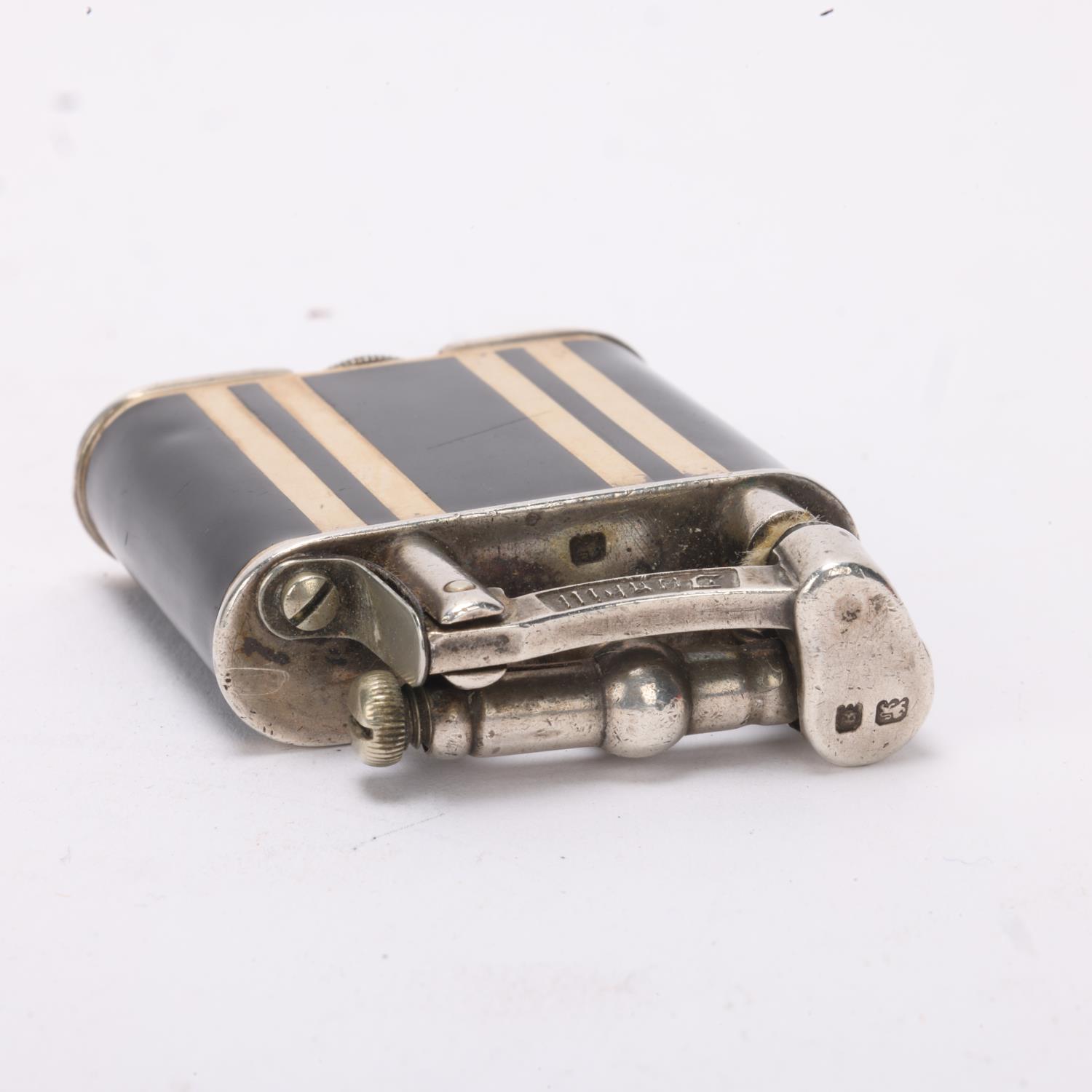 A 1929 hallmarked silver Dunhill lighter, with gilt and black lacquer body, gilt metal crown detail, - Image 4 of 4