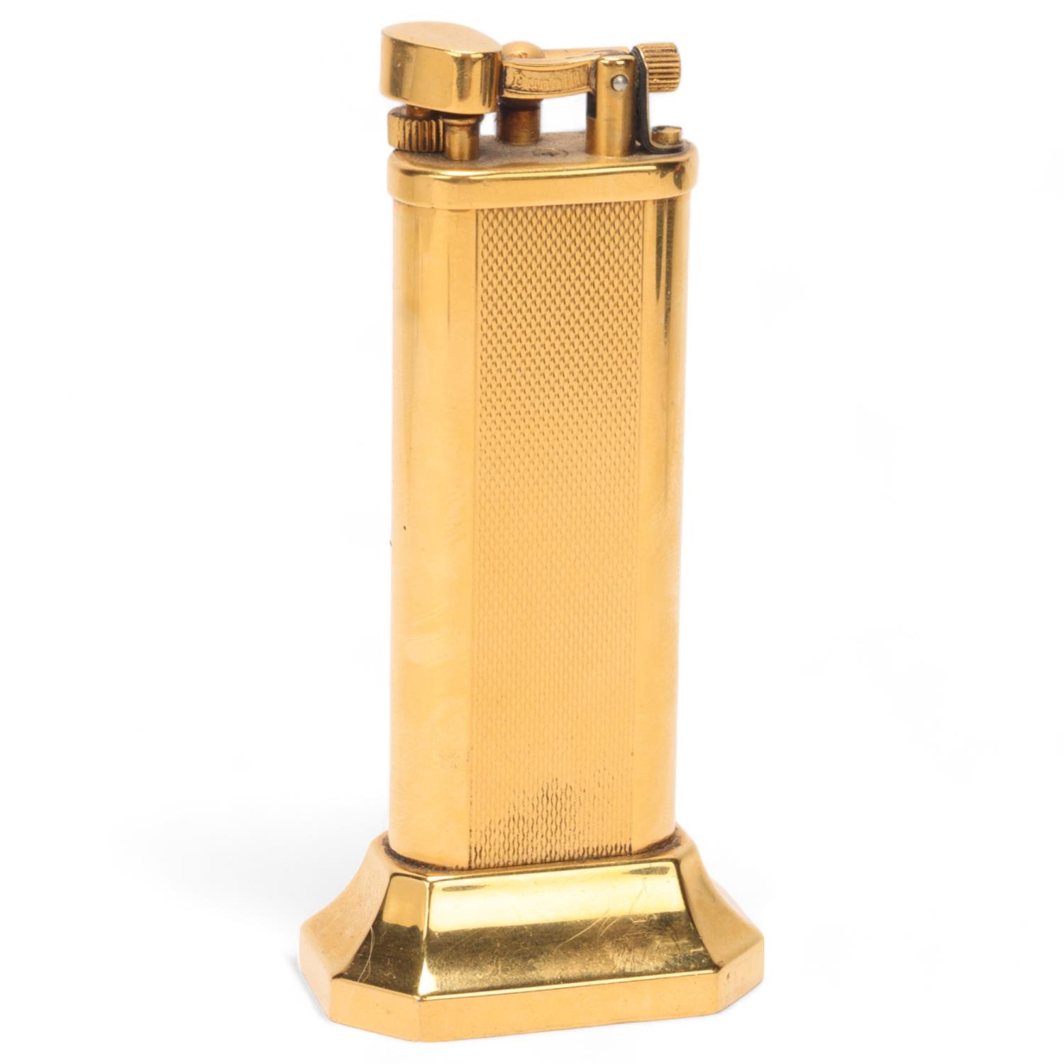 A vintage Dunhill gold plated table lighter, makers marks to base, No 18763, height 10cm Hammer